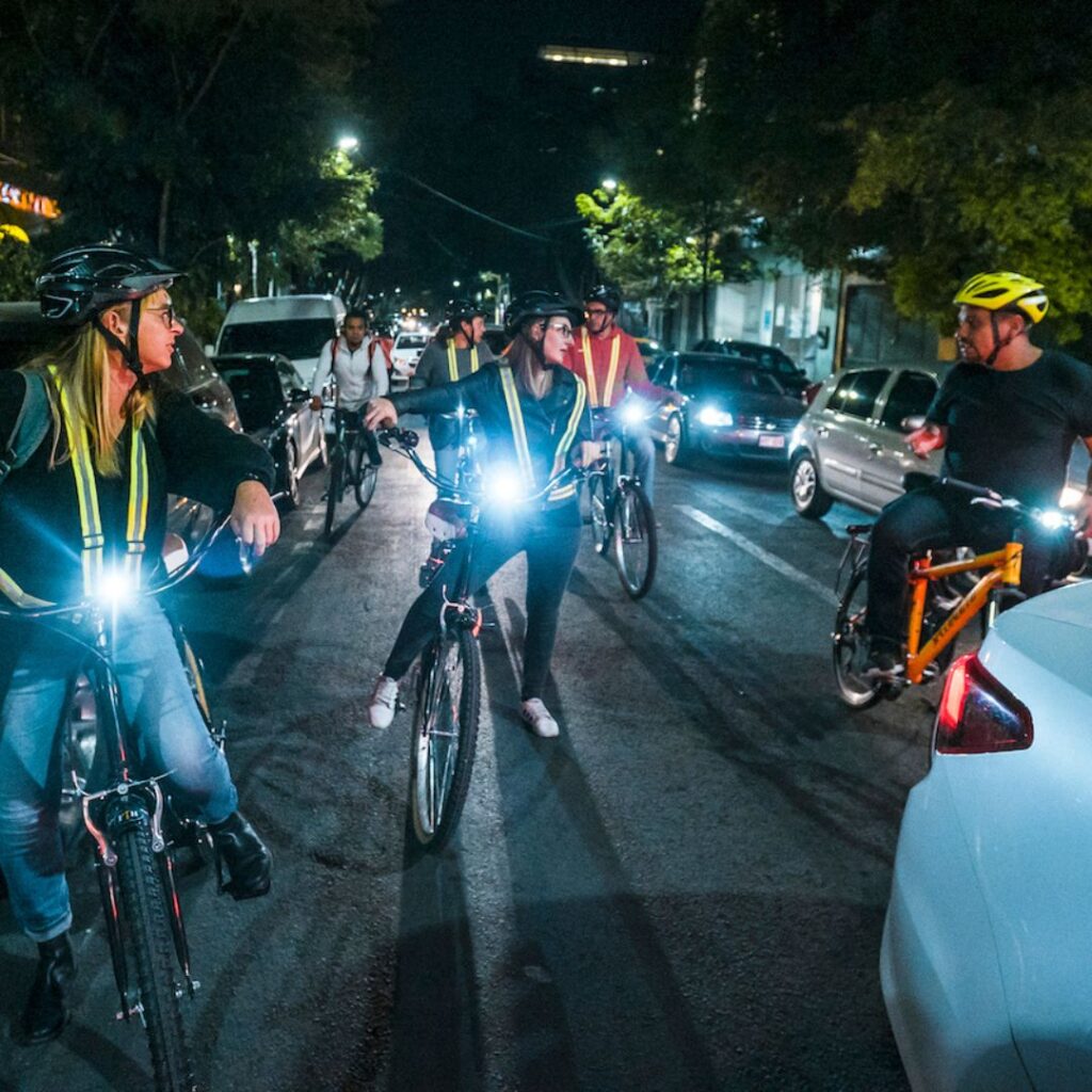 Night street food bike tour, Mexico City, Street food, Biking, Tour, Culture, Local, Tasty, Adventure, Exploration, Authentic, Gastronomy, Landmarks, Hidden gems, Nightlife, Illuminated, Vibrant, Colors, Foodie.